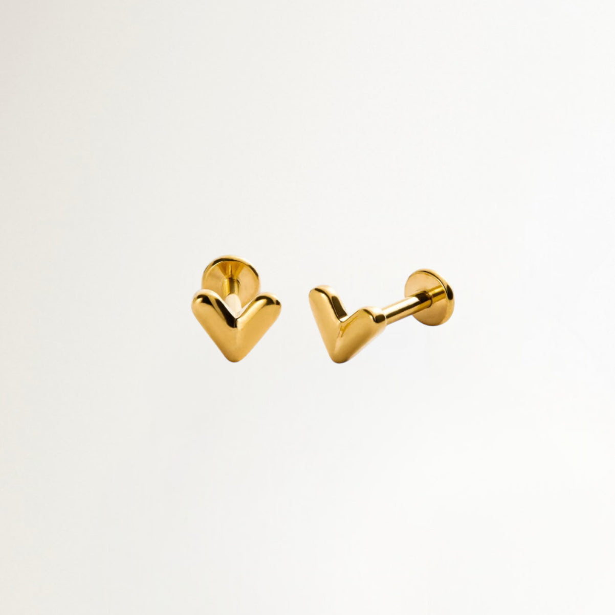 PIERCING CORAZON CURVO DORADO