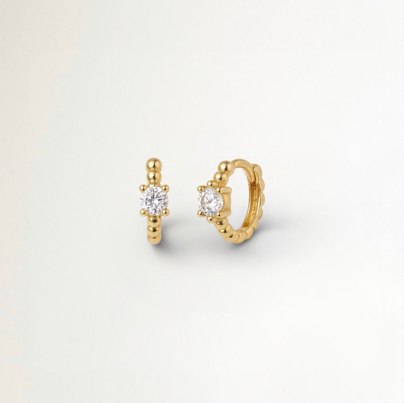 ARITOS CIRCON CENTRAL BAÑADAS EN ORO