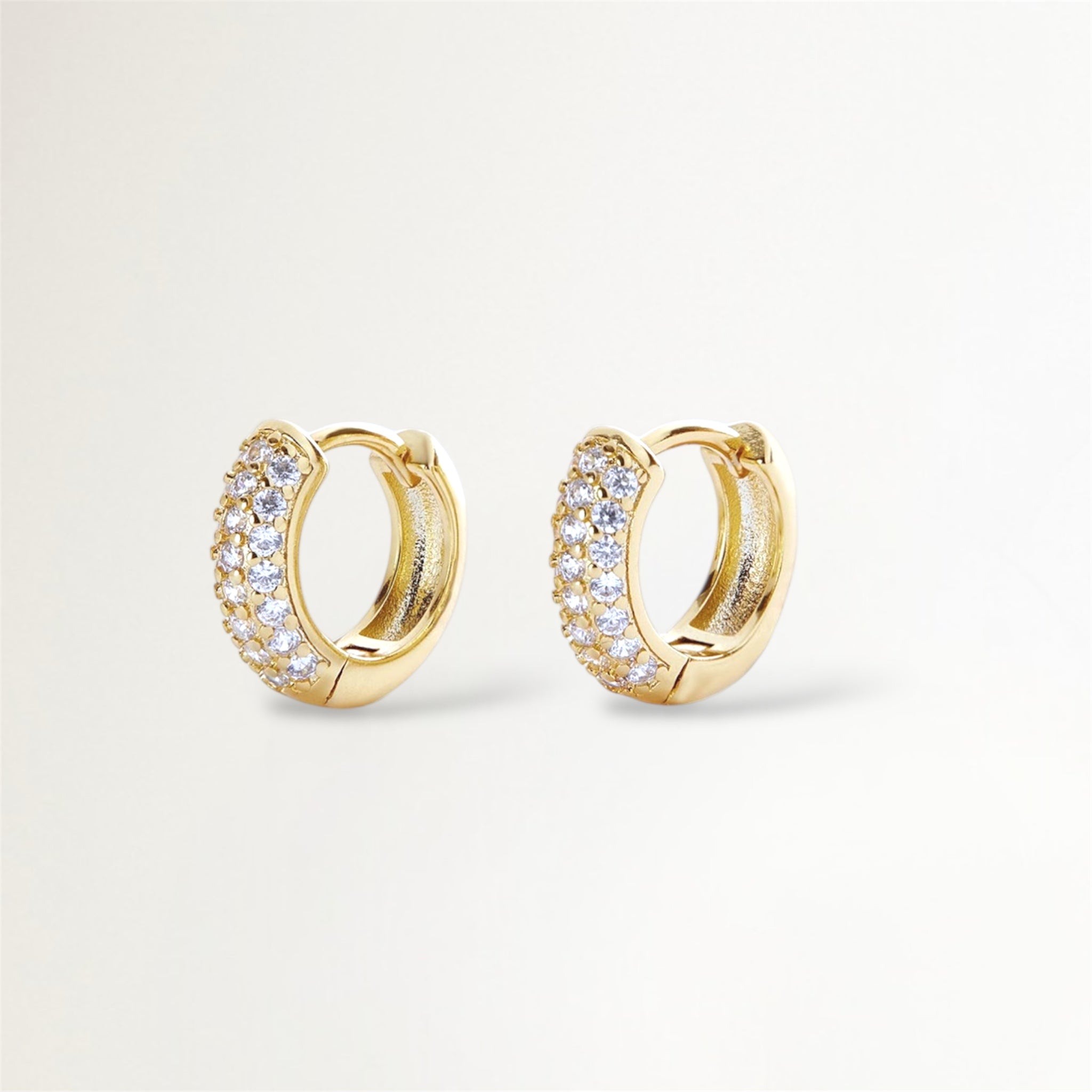 ARGOLLAS DORADAS TRIPLE HILERA DE CIRCONES